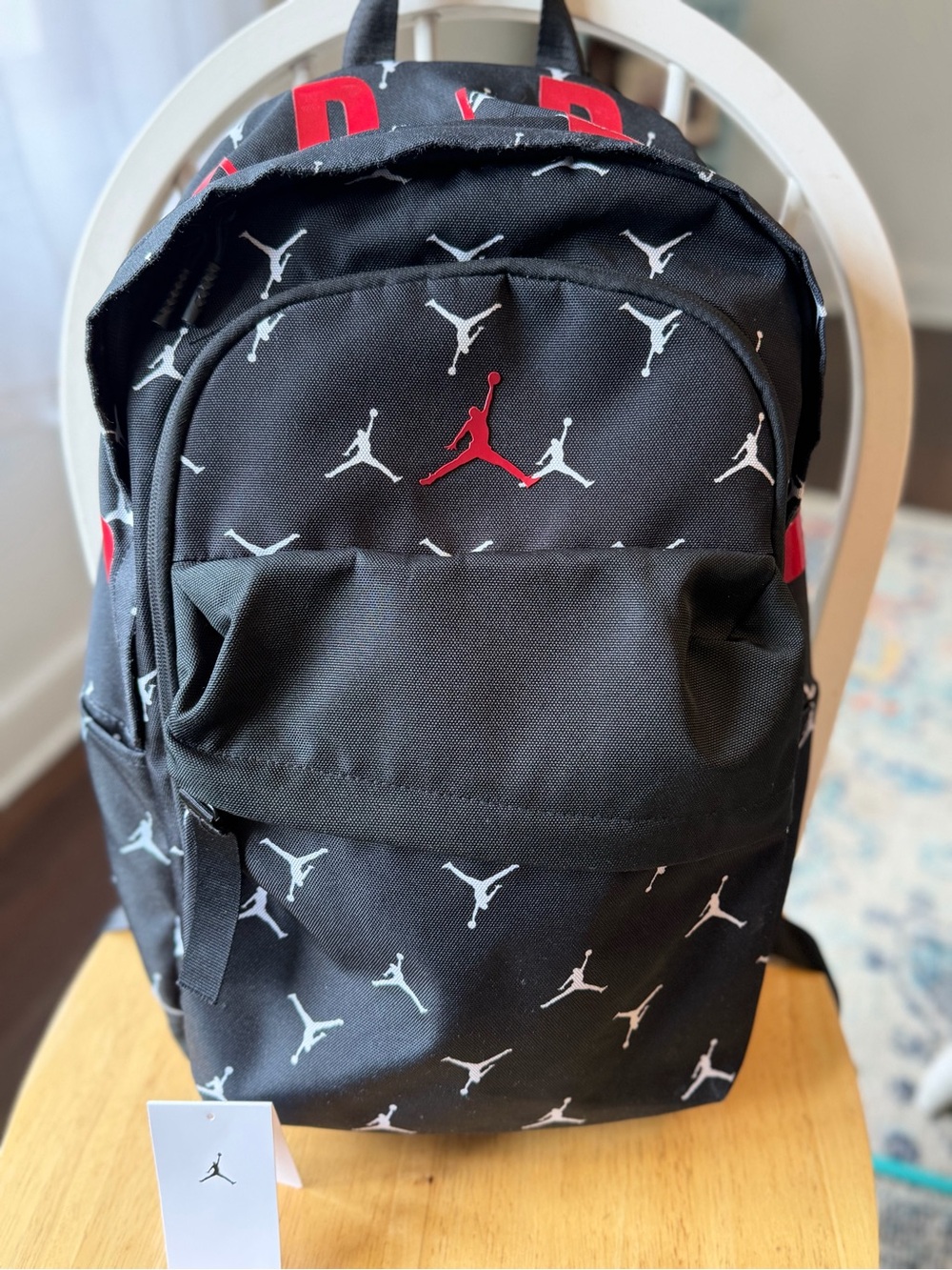Jordan Black Backpack with Red Jumpman and White Logo Pattern